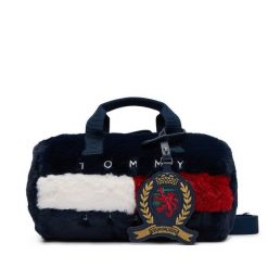 Torebka Tommy Jeans. Niebieskie torebki do ręki damskie Tommy Jeans, bez wzorów, z jeansu, klasyczne, bez dodatków. Za 449.99 zł.