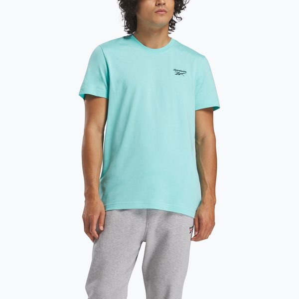 Koszulka Reebok Identity Small Logo Tee. Niebieskie koszulki sportowe męskie REEBOK FITNESS, m, bez wzorów, z materiału, bez kołnierzyka, bez ramiączek, na fitness i siłownię. Za 66.99 zł.