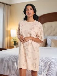 Koszula nocna Disney - kremowy. Białe koszule nocne damskie Sinsay, l, bez wzorów, z bawełny, krótkie. Za 39.99 zł.