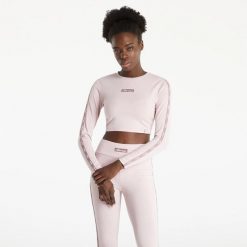 KOSZULKA DAMSKA Z DŁUGIM RĘKAWEM BLUZKA CROP ELLESSE. Czerwone koszulki sportowe damskie Ellesse, uniwersalny, bez wzorów, z materiału, bez kołnierzyka, bez ramiączek, na fitness i siłownię. Za 116.99 zł.