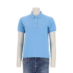 Second life - Lacoste Polo damskie z krótkim rękawem - Stan bardzo dobry. Niebieskie koszulki sportowe damskie Lacoste, l, bez wzorów, bez kołnierzyka, bez ramiączek, tenisowe. Za 127.76 zł.