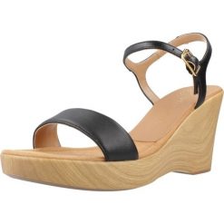 Sandały UNISA RITA NTO Czarny. Czarne obuwie sportowe damskie Unisa, bez wzorów, ze skóry, trekkingowe. Za 354.99 zł.