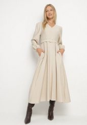 Beżowa Wiskozowa Sukienka o Rozkloszowanym Kroju z Paskiem z Klamerką Arilesse. Brązowe sukienki damskie Born2be, na co dzień, l, bez wzorów, z materiału, eleganckie, bez kołnierzyka, bez ramiączek, rozkloszowane. Za 159.99 zł.