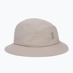 Kapelusz On Trail. Brązowe czapki i kapelusze męskie On, na lato, bez wzorów, z materiału, eleganckie. Za 249.99 zł.