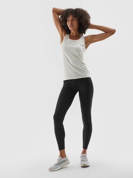 4F Legginsy treningowe ze średnim stanem damskie - czarne M. Czarne legginsy damskie 4f, m, bez wzorów, z dzianiny, na fitness i siłownię. Za 119.99 zł.