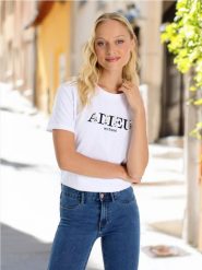 Koszulka - biały. Białe t-shirty damskie Sinsay, l, bez wzorów, z bawełny, bez kołnierzyka. W wyprzedaży za 12.99 zł.