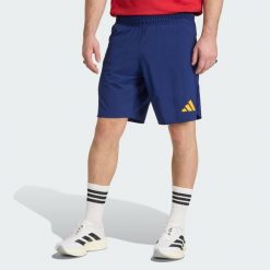 Szorty Hiszpania Tiro Travel. Niebieskie buty sportowe męskie Adidas, bez zapięcia, na fitness i siłownię. Za 219.00 zł.