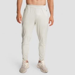 Spodnie męskie do biegania slim szare Pulse X. Szare spodnie sportowe męskie GYMBEAM, m, bez wzorów, z elastanu, do biegania. Za 127.90 zł.