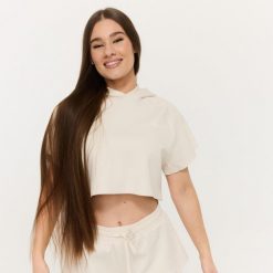 Bluza damska fitness z kapturem krótka Relay Cropped Pearl. Białe bluzy damskie GYMBEAM, l, bez wzorów, z bawełny, z kapturem, na fitness i siłownię. Za 128.90 zł.