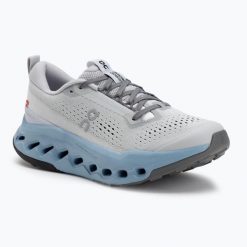 Buty do biegania damskie On Cloudsurfer Trail 2. Szare obuwie sportowe damskie On, bez wzorów, do biegania. Za 609.99 zł.