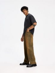Jeansy baggy tapered - pomarańczowy. Brązowe jeansy męskie Reserved. Za 159.99 zł.