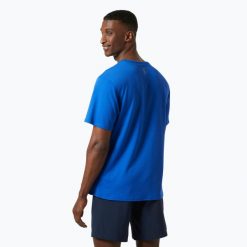 Koszulka męska Helly Hansen Lifa Tech Graphic. Niebieskie koszulki sportowe męskie Helly Hansen, m, bez wzorów, bez kołnierzyka, bez ramiączek, trekkingowe. W wyprzedaży za 176.45 zł.