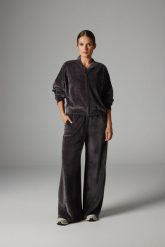 WELUROWE SPODNIE NELLI ANTRACYT M - Flawless. Szare spodnie materiałowe damskie Flawless, m, bez wzorów, z materiału, z podwyższonym stanem. Za 299.00 zł.