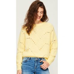 Ażurowy sweter - Żółty. Swetry damskie marki Calvin Klein Jeans. Za 59.99 zł.