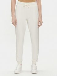 Tommy Hilfiger Spodnie dresowe UW0UW04785 Écru Regular Fit. Spodnie dresowe damskie Tommy Hilfiger, xl, bez wzorów, z dresówki. Za 209.99 zł.