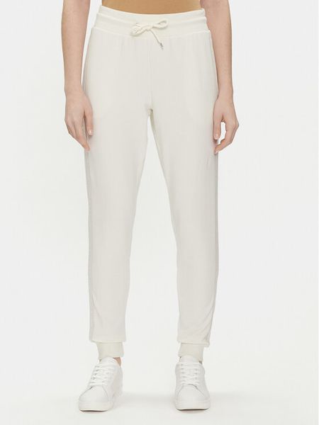 Tommy Hilfiger Spodnie dresowe UW0UW04785 Écru Regular Fit. Spodnie dresowe damskie Tommy Hilfiger, m, bez wzorów, z dresówki. Za 209.99 zł.