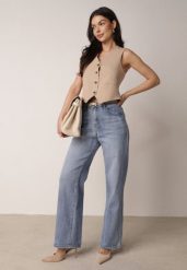 Niebieskie Szerokie Jeansy z Bawełny z Wysokim Stanem Berinielle. Niebieskie jeansy damskie Born2be, z podwyższonym stanem. Za 99.99 zł.