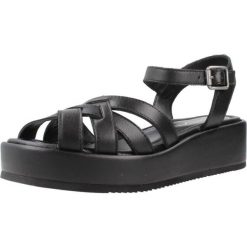 Sandały UNISA KOFY GRA Czarny. Czarne sandały damskie Unisa, bez wzorów, ze skóry, bez obcasa, bez zapięcia. Za 484.99 zł.