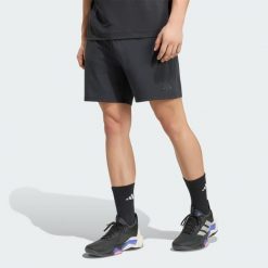 Szorty Puremotion. Czarne krótkie spodenki sportowe męskie Adidas, l, bez wzorów, z dzianiny, na fitness i siłownię, climacool (adidas). Za 219.00 zł.