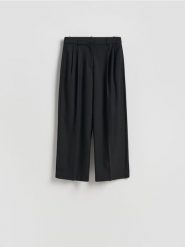 Spodnie carrot fit - czarny. Czarne spodnie materiałowe damskie Reserved, l, bez wzorów, z tkaniny. Za 139.99 zł.