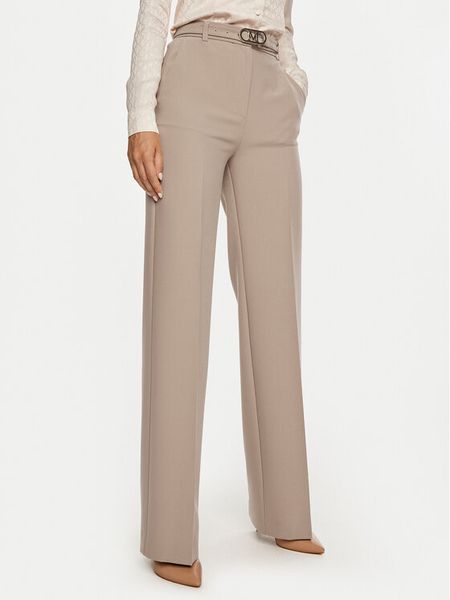 Marciano Guess Spodnie materiałowe Celia 4BGB03 7046A Beżowy Regular Fit. Brązowe spodnie materiałowe damskie Marciano Guess, z aplikacjami, z materiału. Za 429.99 zł.