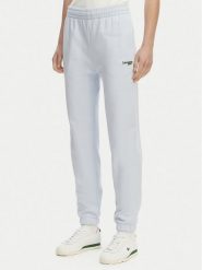 Lacoste Spodnie dresowe XF7604 Niebieski jasny Regular Fit. Niebieskie spodnie dresowe damskie Lacoste, bez wzorów, z bawełny. Za 569.99 zł.