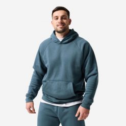 Bluza sportowa z kapturem męska Domyos. Niebieskie bluzy męskie DOMYOS, l, bez wzorów, z bawełny, z kapturem, na fitness i siłownię. Za 179.99 zł.