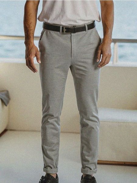 Spodnie eleganckie - szary. Szare eleganckie spodnie męskie Sinsay, l, bez wzorów. W wyprzedaży za 19.99 zł.