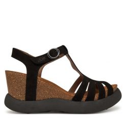 Sandały Fly London. Czarne sandały damskie Fly London, bez wzorów, bez obcasa, na koturnie, bez zapięcia. Za 429.99 zł.