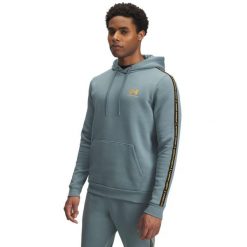 Bluza z kapturem z logo na paskach Under Armour Icon Fleece. Niebieskie bluzy męskie Under Armour, bez wzorów, z kapturem. Za 348.50 zł.
