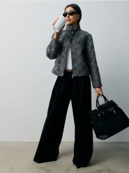 Spodnie wide leg z zakładkami - czarny. Czarne spodnie materiałowe damskie Sinsay, l, bez wzorów. Za 49.99 zł.
