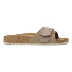 Klapki damskie BIRKENSTOCK Oita W LENB/LEVE Taupe. Brązowe klapki damskie Birkenstock, bez wzorów, z zamszu, wizytowe, bez obcasa. Za 449.99 zł.