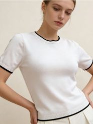 Wiskozowa bluzka - biały. Białe bluzki damskie Sinsay, l, bez wzorów, z wiskozy, bez kołnierzyka, bez ramiączek. Za 39.99 zł.