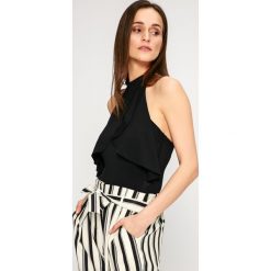 Answear - Top Stripes Vibes. Czarne koszule damskie ANSWEAR, l, bez wzorów, z dzianiny, casualowe, bez kołnierzyka, bez ramiączek. W wyprzedaży za 24.90 zł.