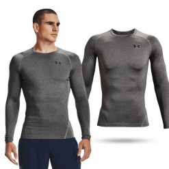 Koszulka fitness męska Under Armour HG Armour Comp z długim rękawem. Czarne koszulki sportowe męskie Under Armour, l, bez wzorów, bez kołnierzyka, bez ramiączek, do biegania. Za 179.99 zł.