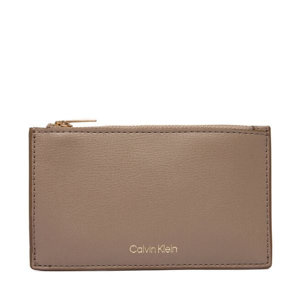 Portfel Calvin Klein. Brązowe portfele damskie Calvin Klein, bez wzorów. Za 152.99 zł.