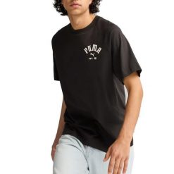 Koszulki Puma Model Classics Relaxed Graphic T Kolor Czarny. Czarne koszulki sportowe męskie Puma, m, bez wzorów, bez kołnierzyka, bez ramiączek. W wyprzedaży za 129.15 zł.