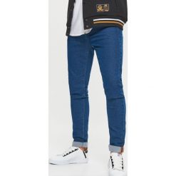 Jeansy SKINNY - Niebieski. Niebieskie jeansy męskie Cropp. Za 89.99 zł.