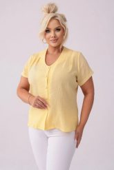 Klasyczna zapinana na guziki bluzka Nel w kolorze pastelowej żółci PLUS SIZE XXL OVERSIZE. Żółte bluzki damskie Moda Size Plus Iwanek, plus size, bez wzorów, z bawełny, eleganckie, bez kołnierzyka, plus size, bez ramiączek. Za 199.90 zł.