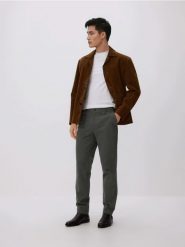 Spodnie chino slim fit - jasnozielony. Zielone spodnie materiałowe męskie Reserved, bez wzorów, z bawełny. Za 159.99 zł.