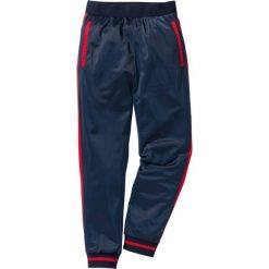 Spodnie sportowe trykotowe bonprix ciemnoniebieski. Spodnie sportowe męskie marki KIPSTA. Za 54.99 zł.