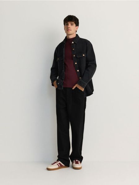 Spodnie loose fit - czarny. Czarne spodnie materiałowe męskie Reserved, l, bez wzorów, z bawełny. W wyprzedaży za 55.99 zł.