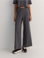 Spodnie wide leg - ciemnoszary. Szare spodnie materiałowe damskie Reserved, l, bez wzorów, z dzianiny. W wyprzedaży za 79.99 zł.