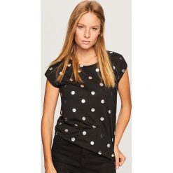 T-shirt we wzory - Czarny. T-shirty damskie marki DOMYOS. Za 39.99 zł.