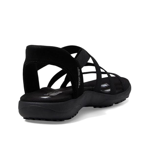 Sandały Skechers Model Reggae Slim Kolor Czarny. Czarne sandały damskie Skechers, bez wzorów, z tkaniny, bez obcasa, bez zapięcia. Za 299.99 zł.