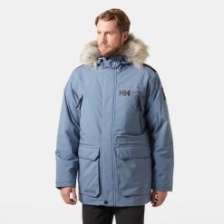 Parka Helly Hansen Reine. Niebieskie kurtki męskie Helly Hansen, na jesień, m, bez wzorów, bez kaptura. W wyprzedaży za 1,157.50 zł.