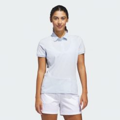 Koszulka Ultimate365 Tour Twistknit Polo. Niebieskie koszulki sportowe damskie Adidas, bez wzorów, z materiału, bez kołnierzyka, bez ramiączek, na golfa. Za 329.00 zł.