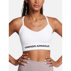 Biustonosz treningowy Under Armour Vanish Seamless Low white/black. Białe obuwie sportowe damskie Under Armour, bez wzorów, na fitness i siłownię. Za 129.99 zł.