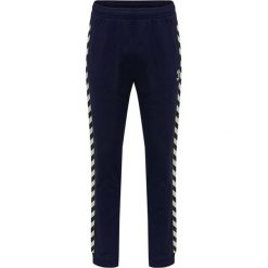 Klasyczne spodnie dresowe damskie Hummel Move Classic. Niebieskie spodnie sportowe damskie Hummel, xs, bez wzorów, z dresówki, na fitness i siłownię. W wyprzedaży za 179.00 zł.