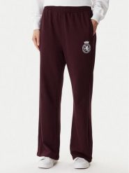 Tommy Hilfiger Spodnie dresowe UW0UW06081 Bordowy Wide Leg. Czerwone spodnie dresowe damskie Tommy Hilfiger, xl, bez wzorów, z bawełny. Za 279.99 zł.
